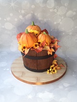 Pumpkins in barrel autumn cake